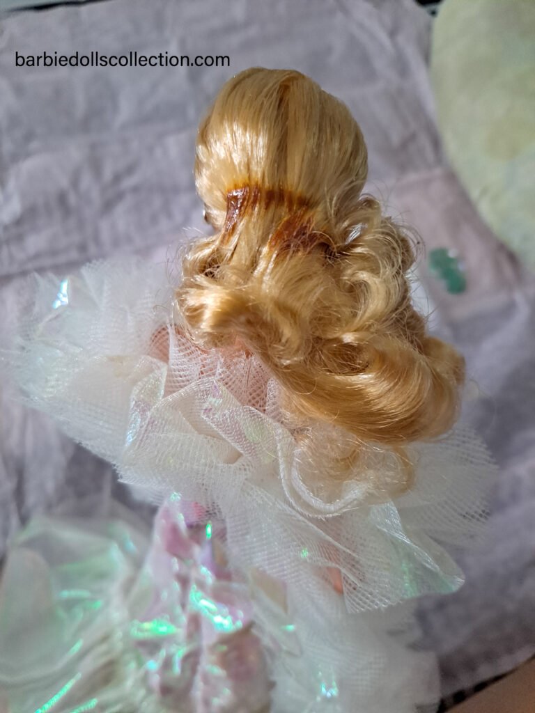 How to remove melted rubber from Barbie's hair?