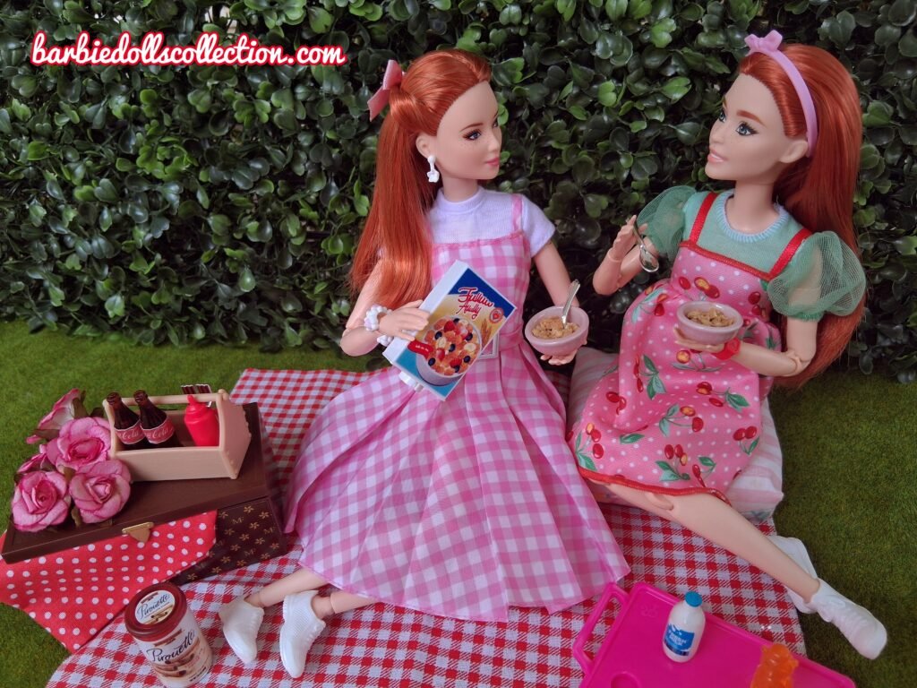 Redhead Barbie sisters enjoying cereal during a summer picnic brunch.