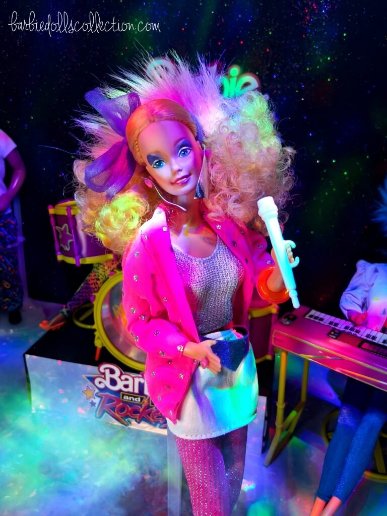 Barbie and The Rockers standing together on the concert stage