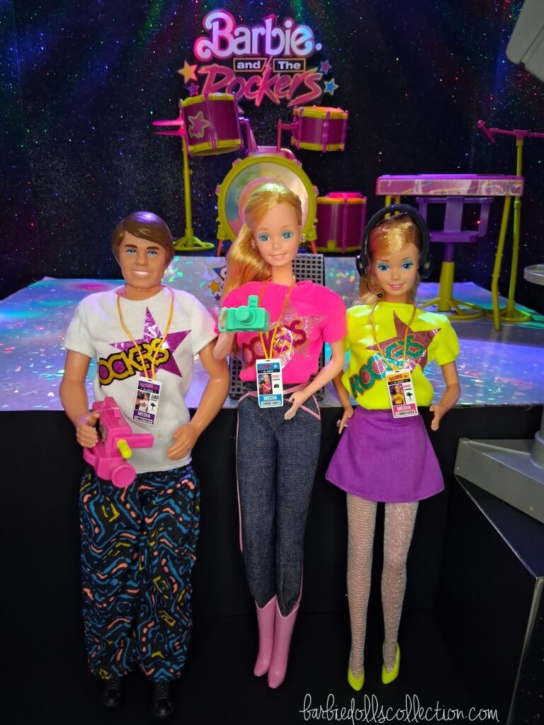 Three media staff members covering the Barbie and The Rockers concert