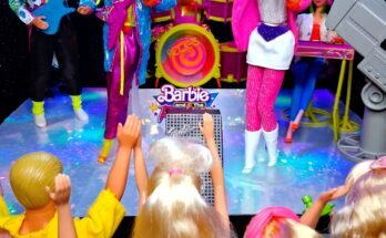 Barbie and The Rockers posing together on the full stage