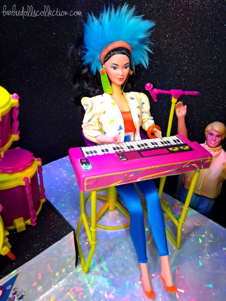 Dana of Barbie and The Rockers standing full body on stage