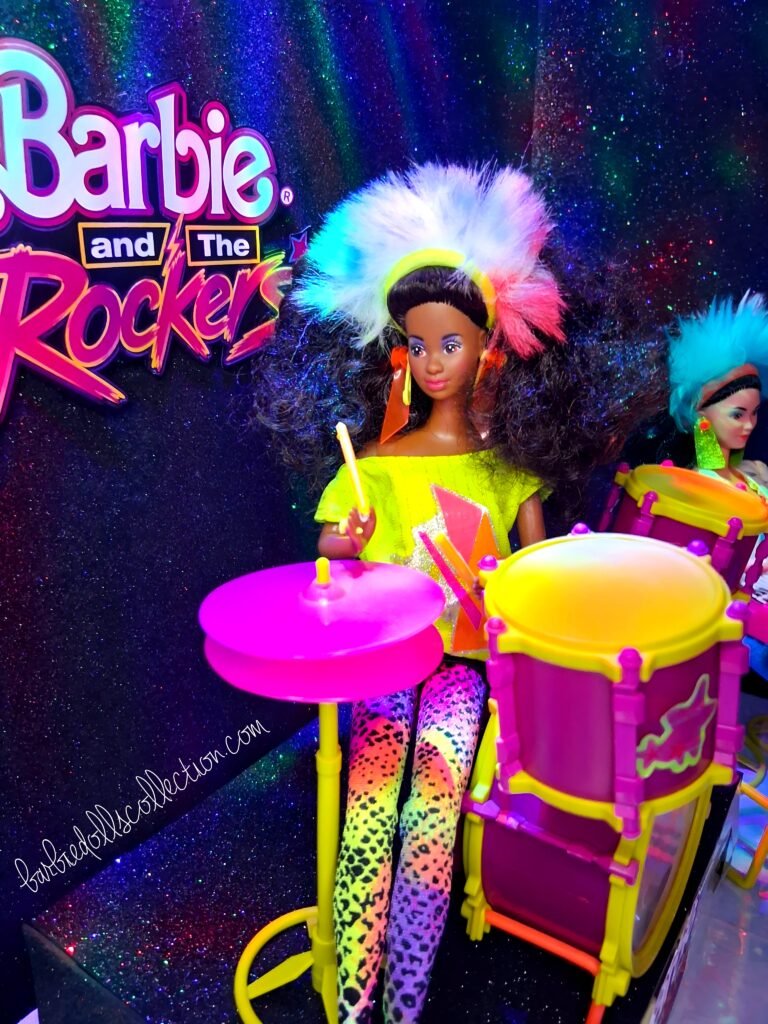 Dee Dee of Barbie and The Rockers performing on drums