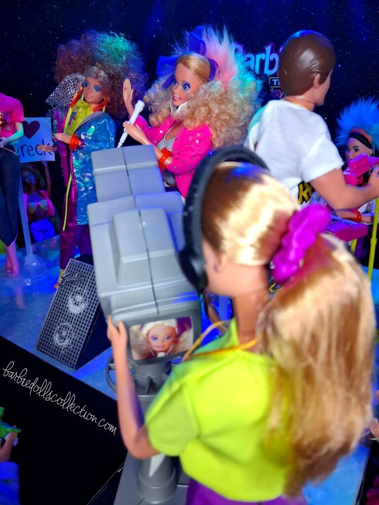 TV camera focusing on Barbie as she performs on stage